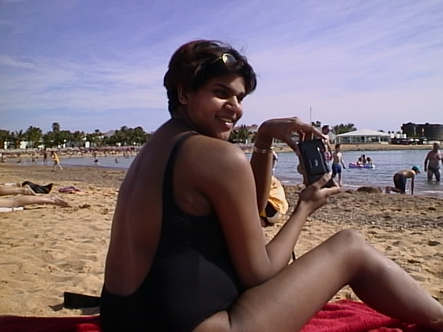 Ta bilder p&aring; stranden f&ouml;r hemsidan.